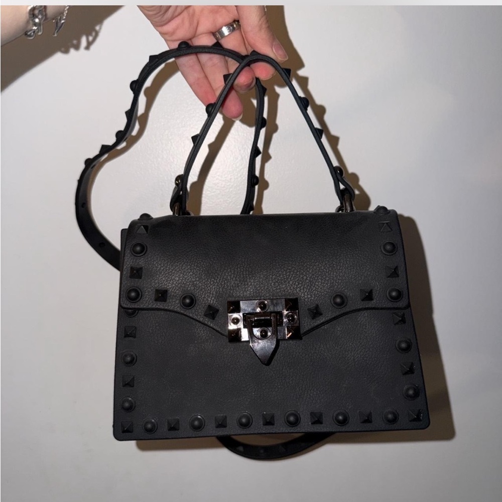 black studded rubber bag